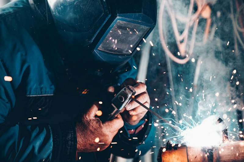 Welder at work in a fabrication shop