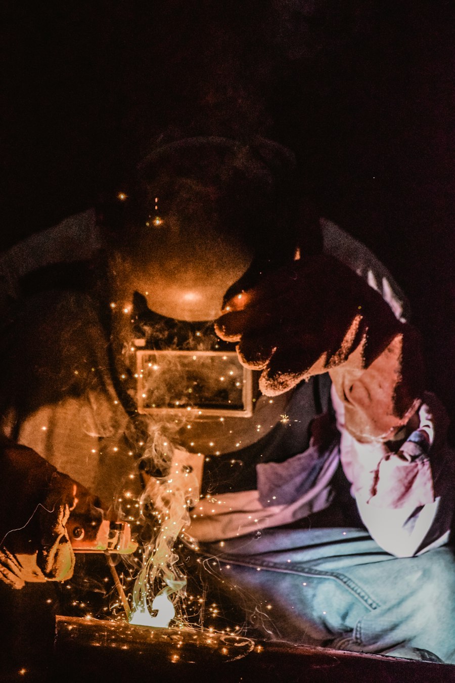 Close-up of a welder joining steel