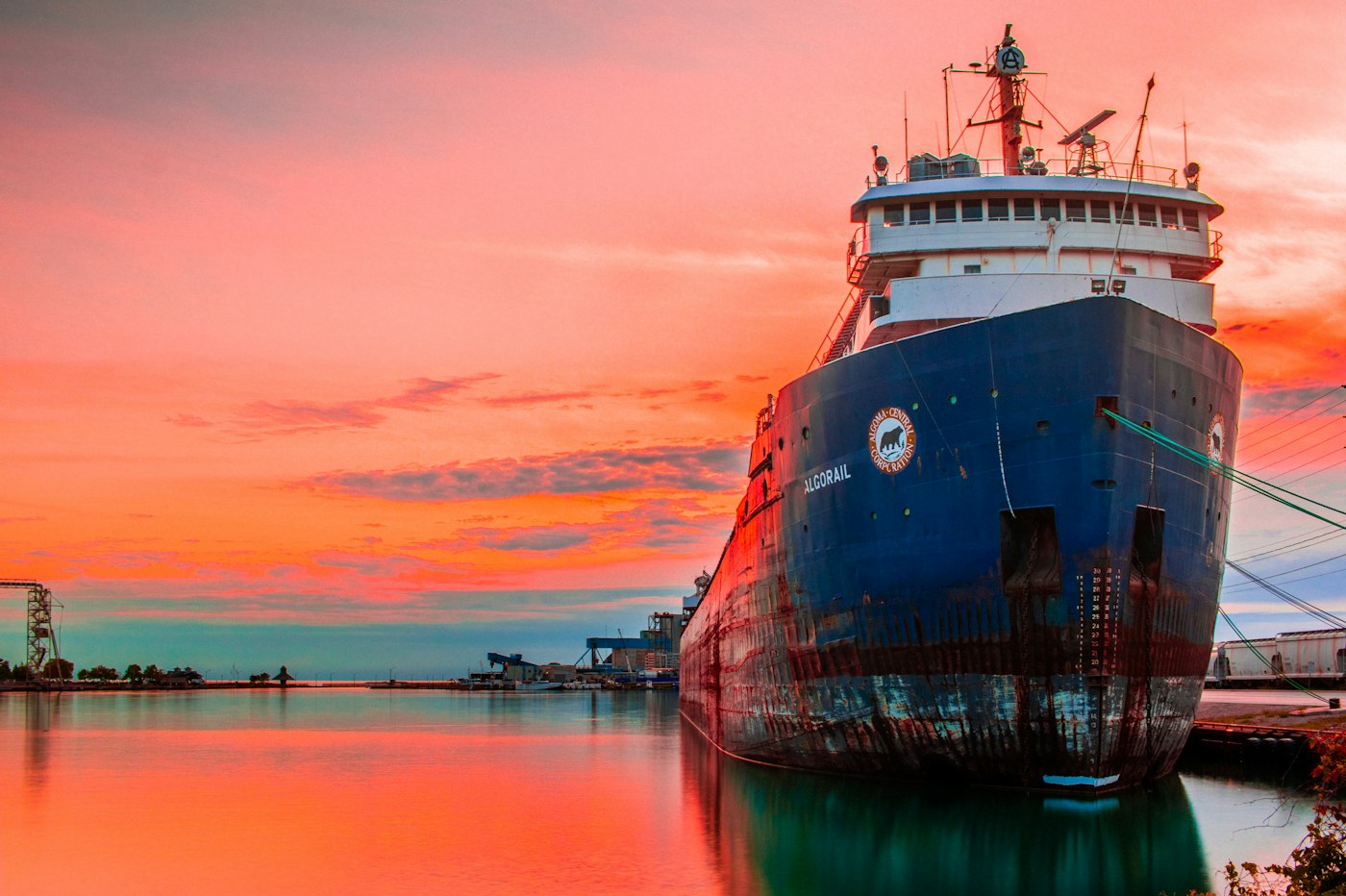 Tanker bow in a dry dock at sunset