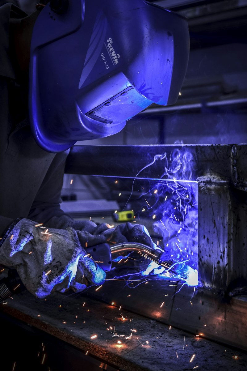 Welder working on a steel frame