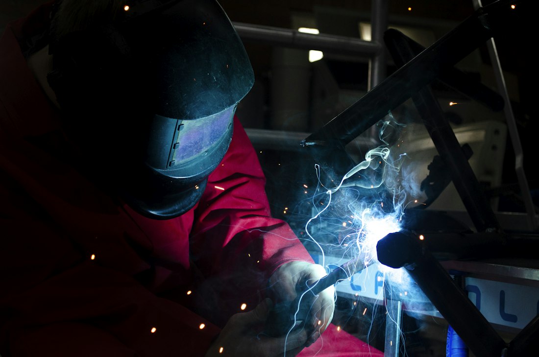 Welder joining a steel fabrication