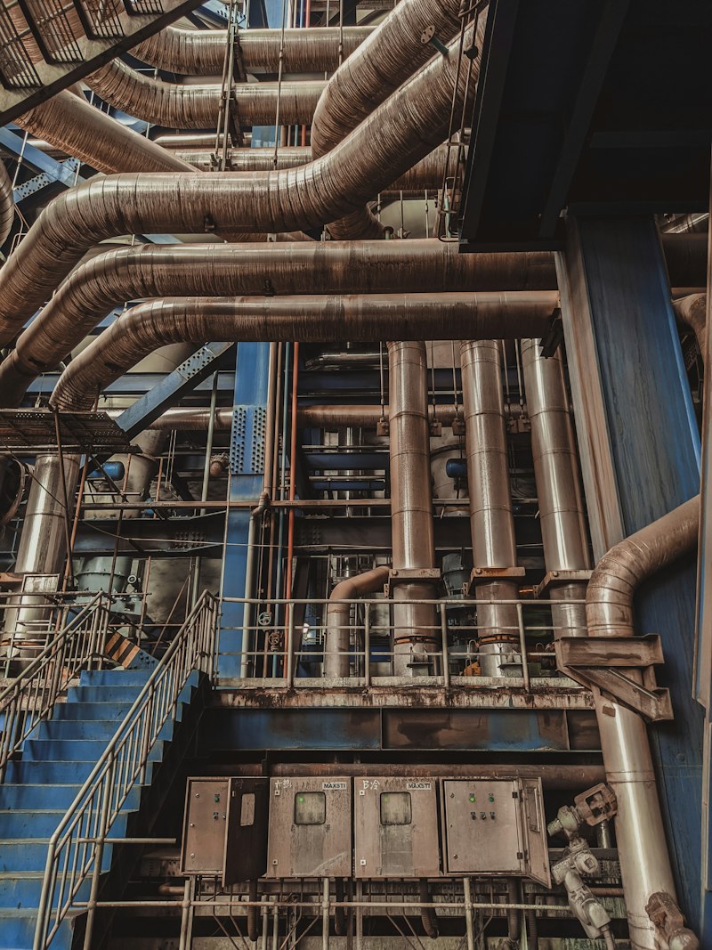 Coated pipework and steel structure inside an industrial plant