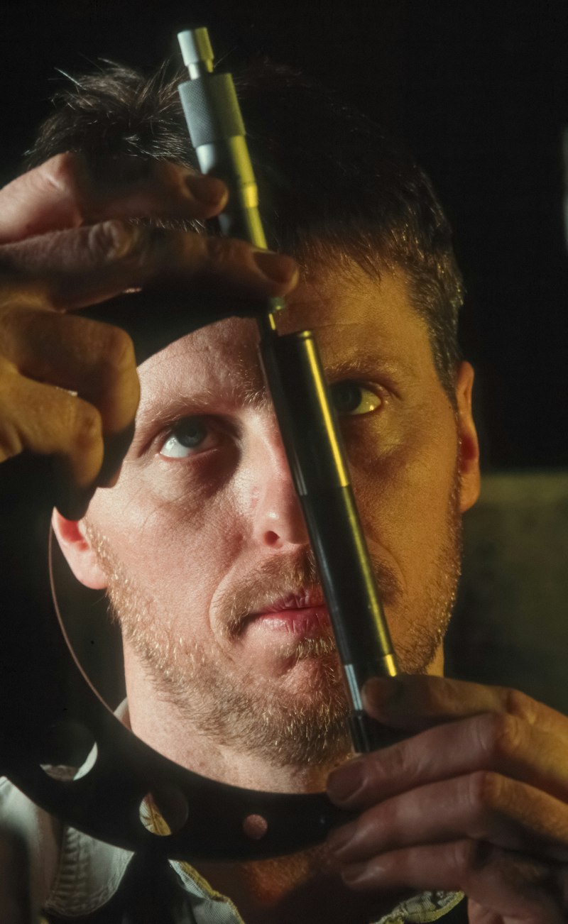 Technician using a precision measuring tool